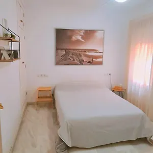 https://apartamento-a-2-minutos-playa-y-del-centro.1costadelsol.com